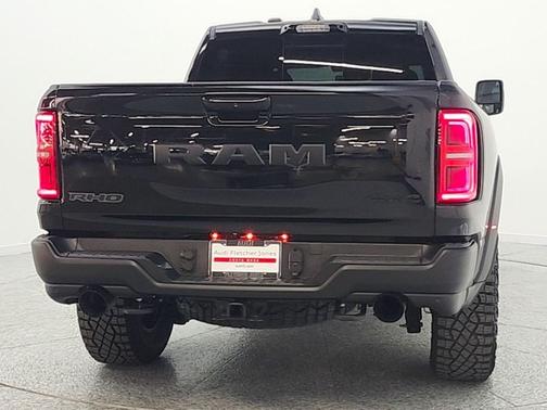 Diamond Black Crystal Pearlcoat 2025 RAM 1500 RHO Crew Cab 4x4 5'7' Box