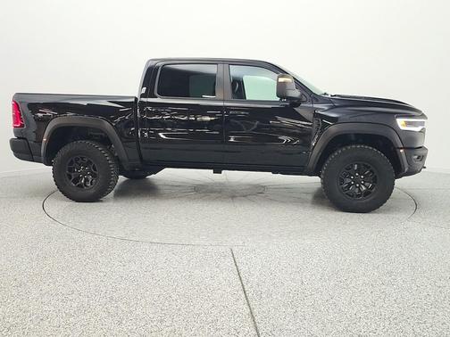 Diamond Black Crystal Pearlcoat 2025 RAM 1500 RHO Crew Cab 4x4 5'7' Box