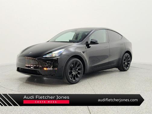 Solid Black 2024 Tesla Model Y Long Range Dual Motor All-Wheel Drive