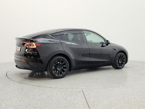 Solid Black 2024 Tesla Model Y Long Range Dual Motor All-Wheel Drive