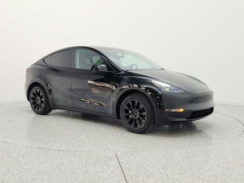Solid Black 2024 Tesla Model Y Long Range Dual Motor All-Wheel Drive