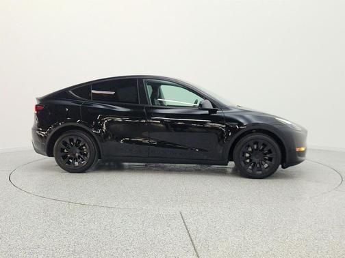 Solid Black 2024 Tesla Model Y Long Range Dual Motor All-Wheel Drive