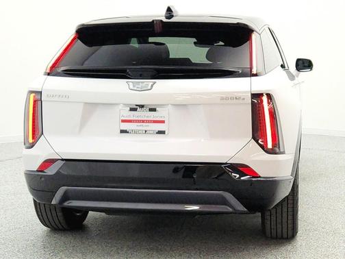Crystal White Tricoat 2025 Cadillac OPTIQ Sport 1 AWD
