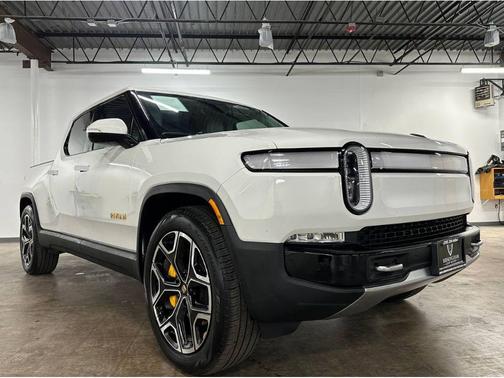 Glacier White 2023 Rivian R1T Adventure Quad Motor Large Pack