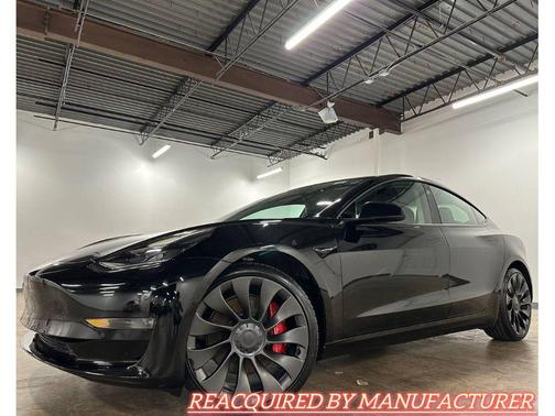 Solid Black 2022 Tesla Model 3 Performance