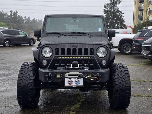 Black 2016 Jeep Wrangler Unlimited Sport