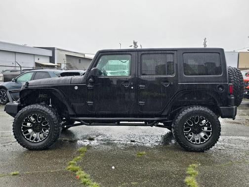 Black 2016 Jeep Wrangler Unlimited Sport