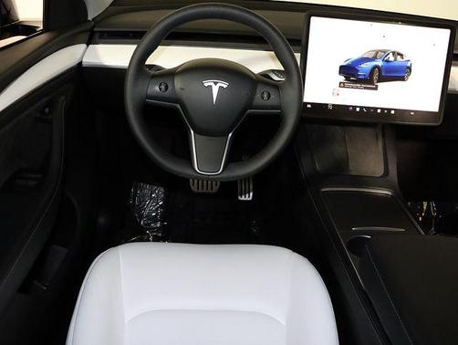 Deep Blue Metallic 2024 Tesla Model Y Performance