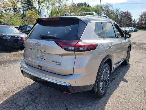 Champagne Silver Metallic/Super Black 2026 Nissan Rogue Platinum