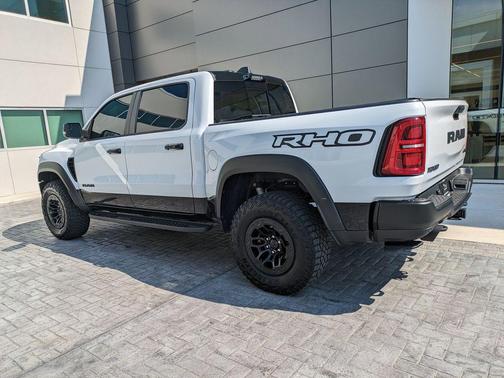 Bright White Clearcoat 2025 RAM 1500 RHO Crew Cab 4x4 5'7' Box