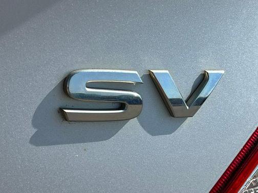 Brilliant Silver Metallic 2013 Nissan Versa 1.6 S