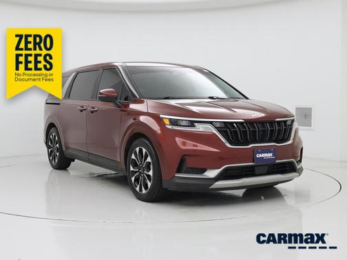 Red 2023 Kia Carnival EX