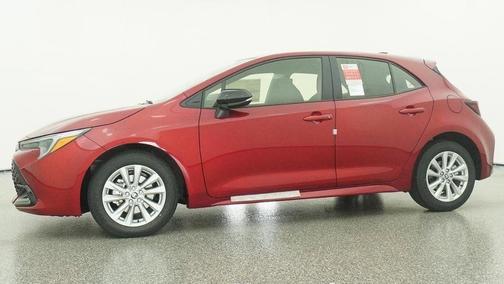 Red 2026 Toyota Corolla Hatchback SE