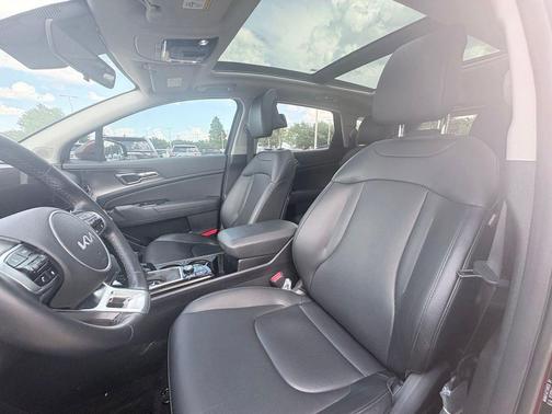 Dawning Red 2025 Kia Sportage SX
