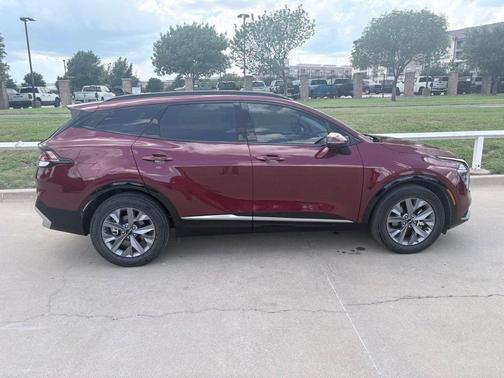 Dawning Red 2025 Kia Sportage SX