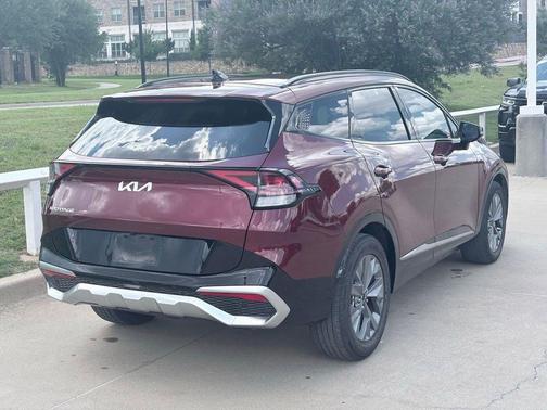 Dawning Red 2025 Kia Sportage SX