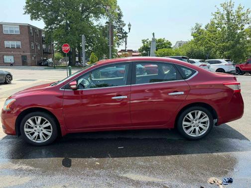 Red 2014 Nissan Sentra SL