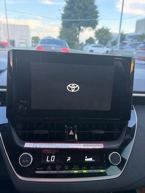 Midnight Black Metallic 2026 Toyota Corolla Hybrid LE
