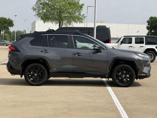 Midnight Black Metallic 2024 Toyota RAV4 Hybrid SE