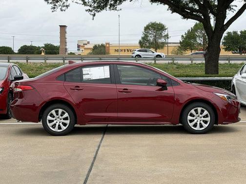 Ruby Flare Pearl 2026 Toyota Corolla Hybrid LE