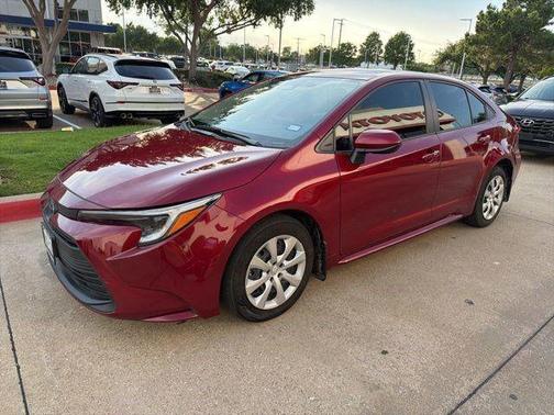 Ruby Flare Pearl 2025 Toyota Corolla Hybrid LE