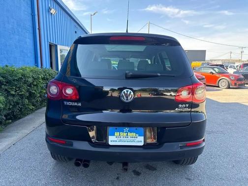 BLACK 2011 Volkswagen Tiguan SEL