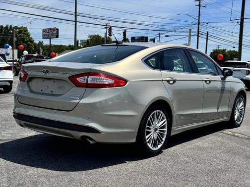 Tangerine Scream Tri-Coat Paint 2015 Ford Fusion SE