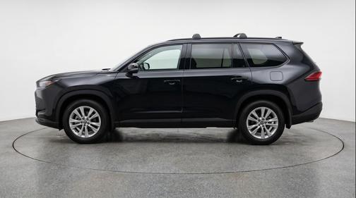 Midnight Black Metallic 2025 Toyota Highlander LE