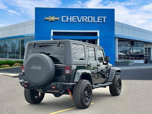 Black 2012 Jeep Wrangler Unlimited Sahara