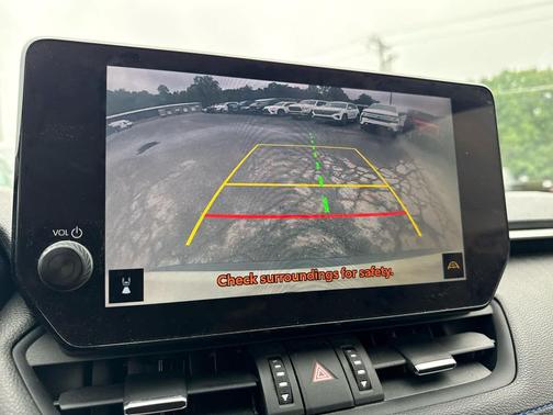 Wind Chill Pearl/Midnight Black Metallic 2023 Toyota RAV4 Hybrid SE