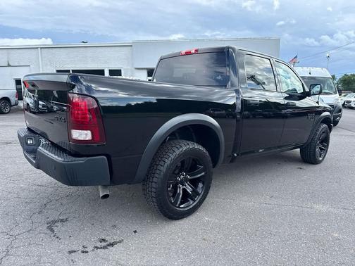 Diamond Black Crystal Pearlcoat 2024 RAM 1500 Classic Warlock 4x4 Crew Cab 57 Box