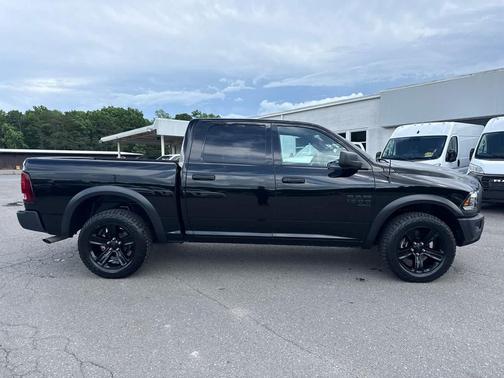 Diamond Black Crystal Pearlcoat 2024 RAM 1500 Classic Warlock 4x4 Crew Cab 57 Box