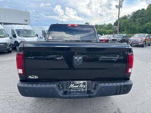 Diamond Black Crystal Pearlcoat 2024 RAM 1500 Classic Warlock 4x4 Crew Cab 57 Box