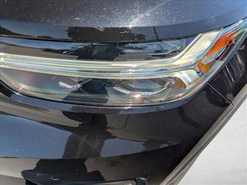 Onyx Black Metallic 2021 Volvo XC40 T4 Momentum