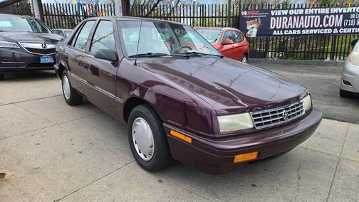 Purple 1993 Plymouth Sundance Sedan 4D