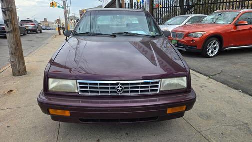Purple 1993 Plymouth Sundance Sedan 4D
