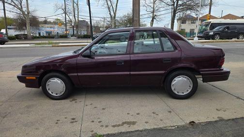 Purple 1993 Plymouth Sundance Sedan 4D