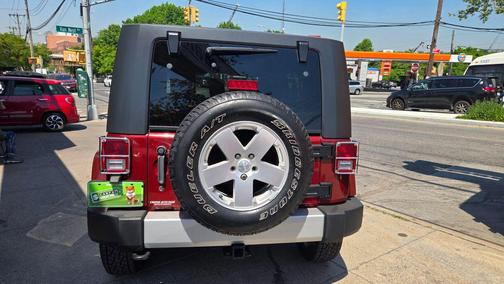 Burgundy 2010 Jeep Wrangler Unlimited Sahara