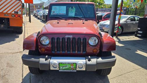 Burgundy 2010 Jeep Wrangler Unlimited Sahara