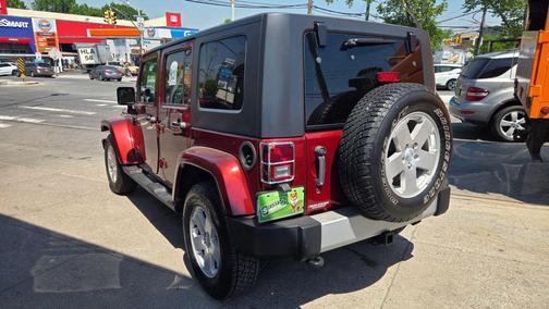 Burgundy 2010 Jeep Wrangler Unlimited Sahara