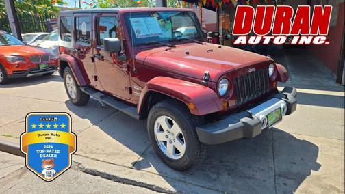 Burgundy 2010 Jeep Wrangler Unlimited Sahara