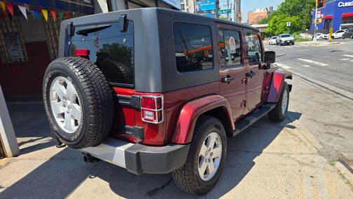 Burgundy 2010 Jeep Wrangler Unlimited Sahara
