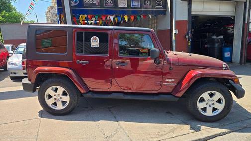 Burgundy 2010 Jeep Wrangler Unlimited Sahara