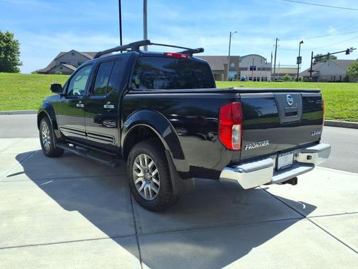Super Black 2010 Nissan Frontier LE