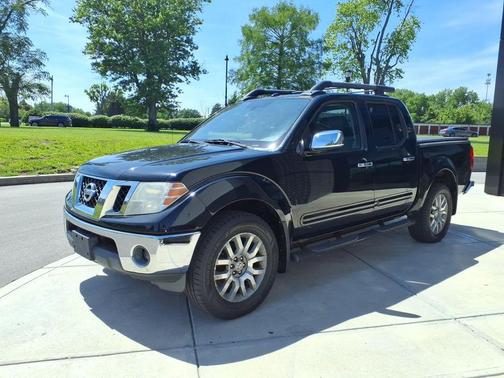 Super Black 2010 Nissan Frontier LE