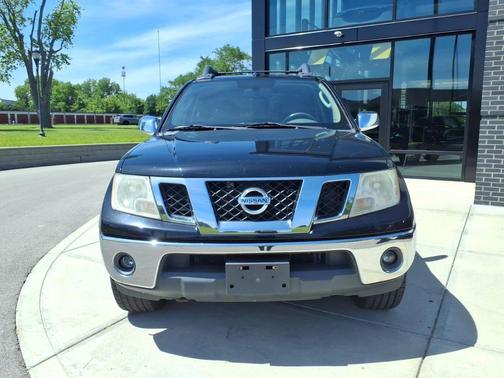 Super Black 2010 Nissan Frontier LE