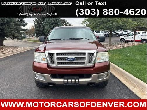 Red 2005 Ford F-150 King Ranch SuperCrew
