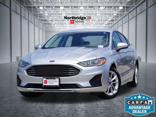 Ingot Silver Metallic 2019 Ford Fusion Hybrid SE