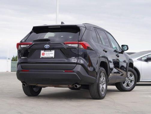 Midnight Black Metallic 2024 Toyota RAV4 Hybrid LE