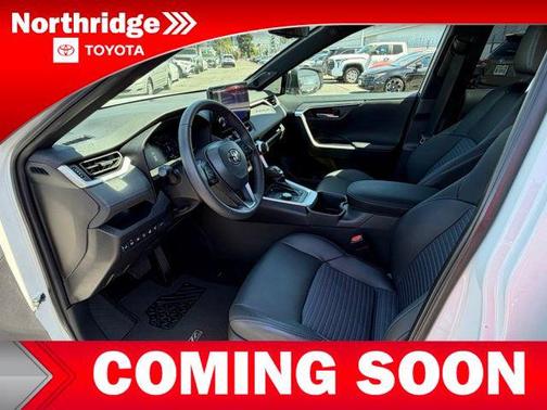 Wind Chill Pearl/Midnight Black Metallic 2023 Toyota RAV4 Hybrid SE